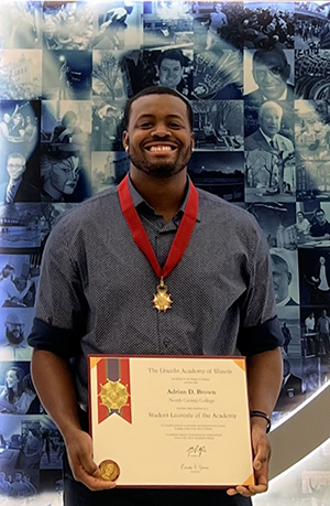 North Central College Lincoln Laureate winner Adrian Brown with his plaque and medal.