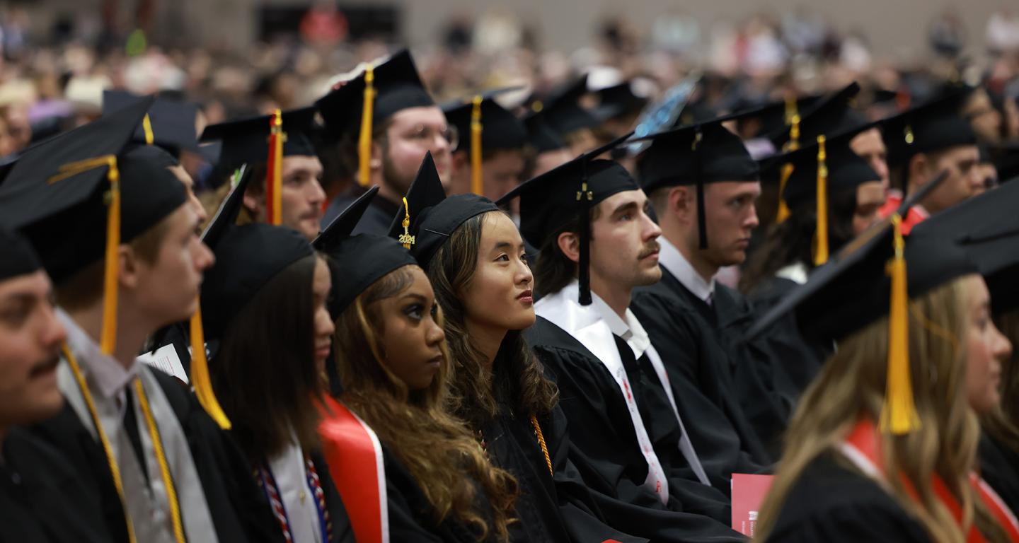 Graduates listen and watch during the 2024 North Central College Commencement Ceremony.