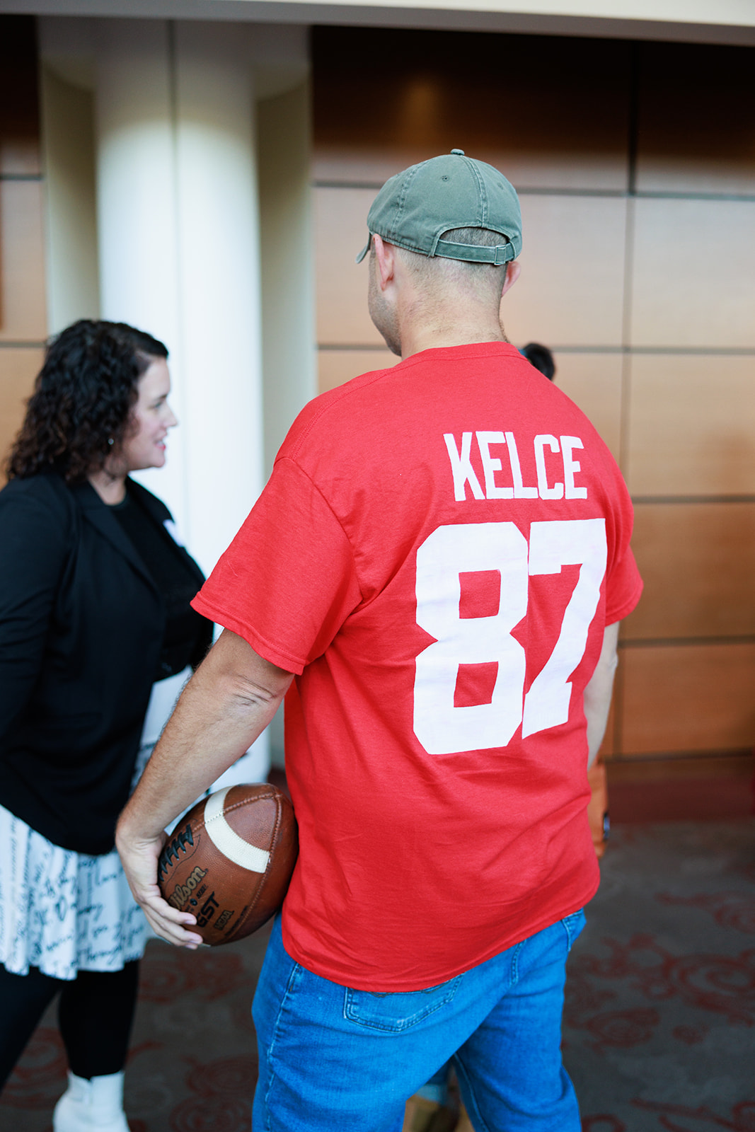 A man wearing a Travis Kelce t-shirt.