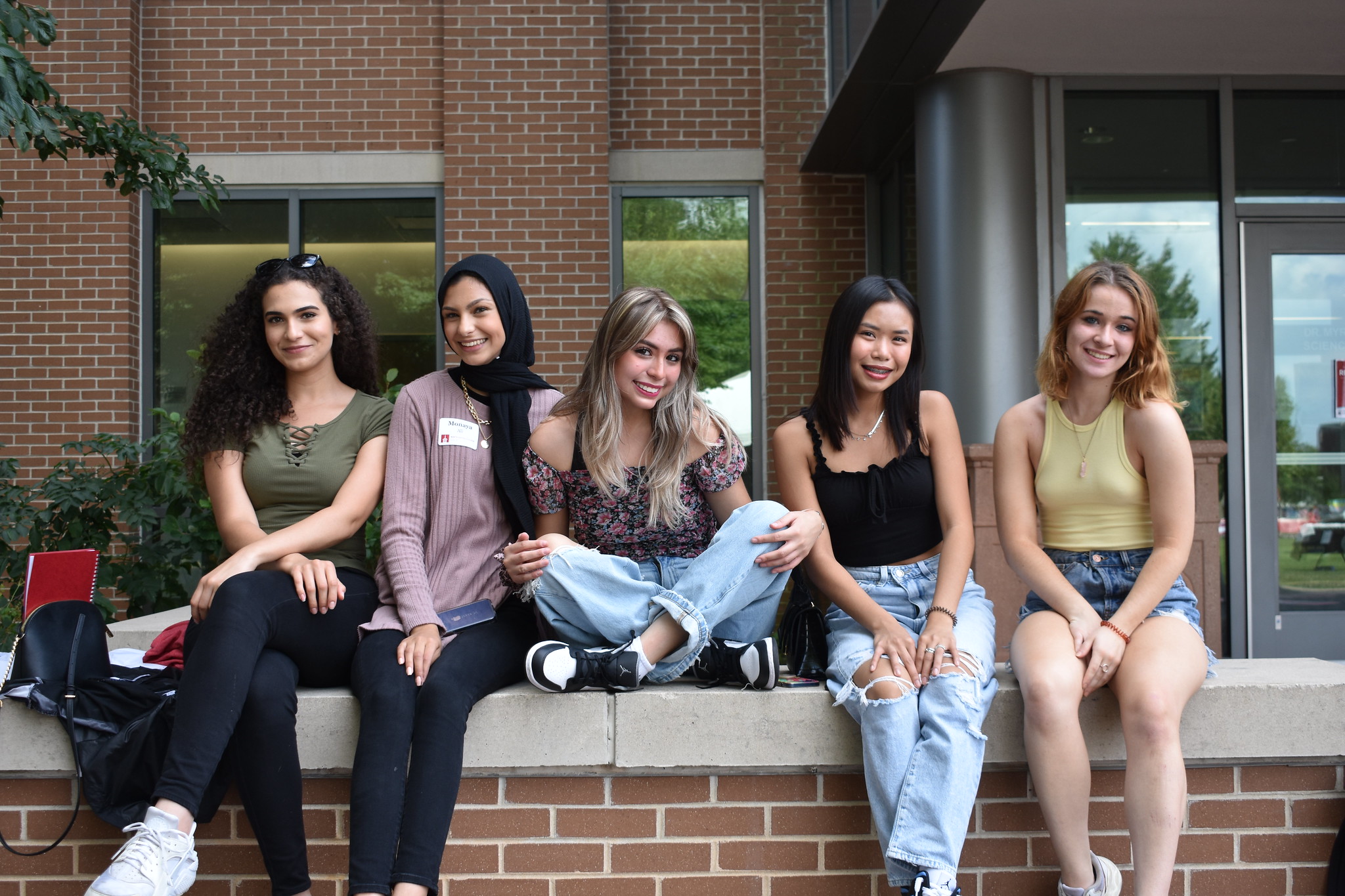 Group of students sitting outside