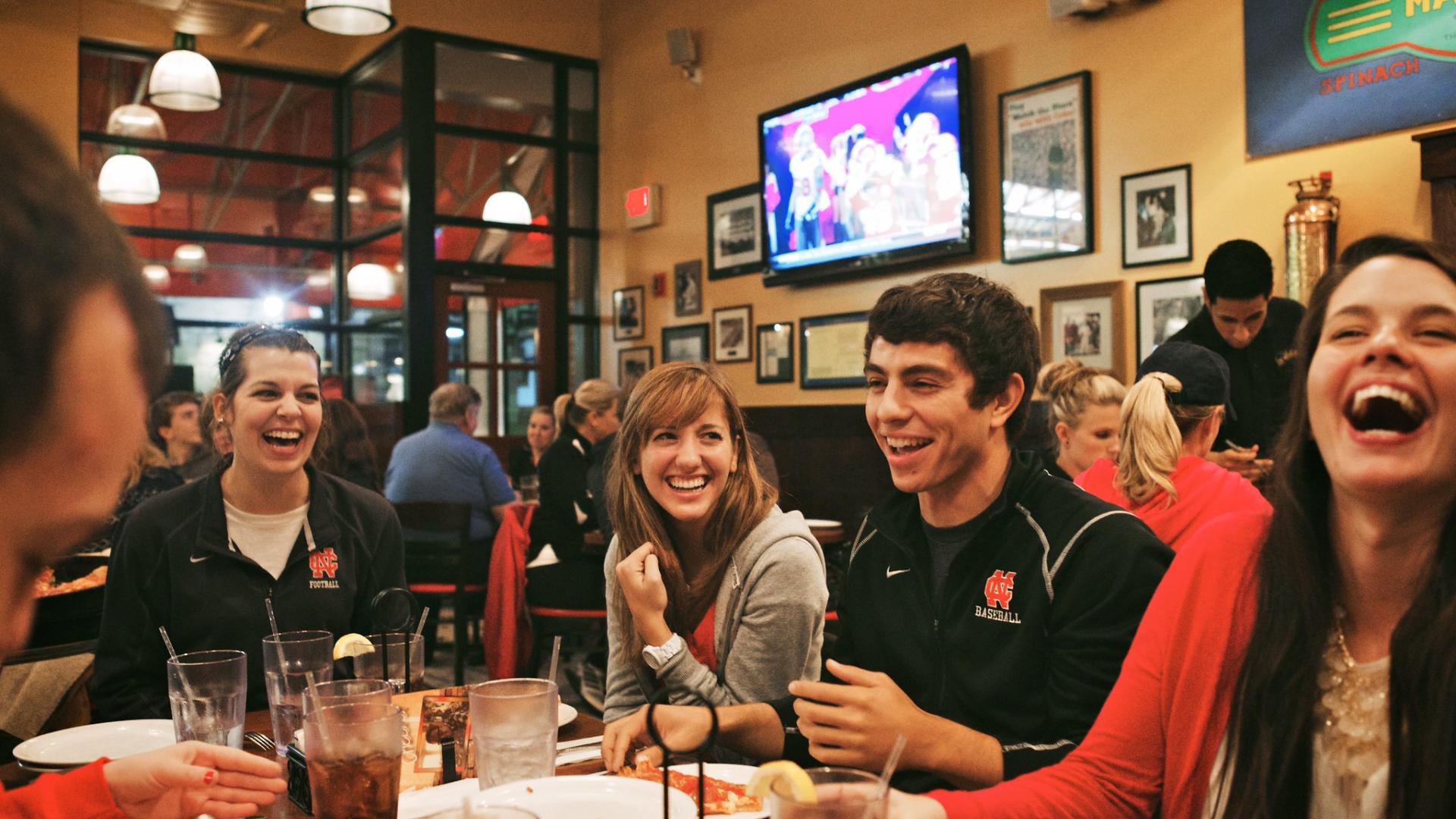 Students sitting around a table