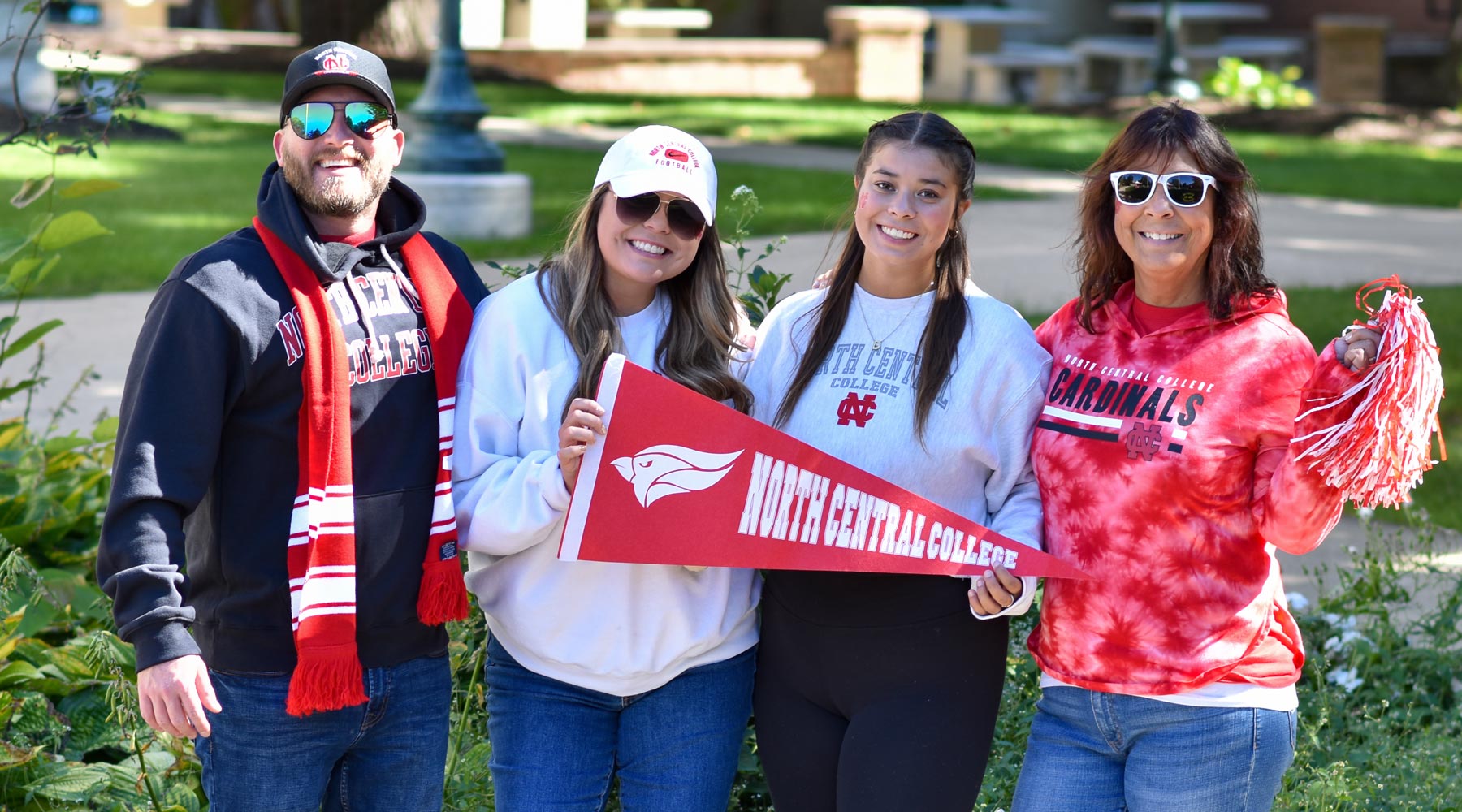 family of 4 with cardinal spirit wear