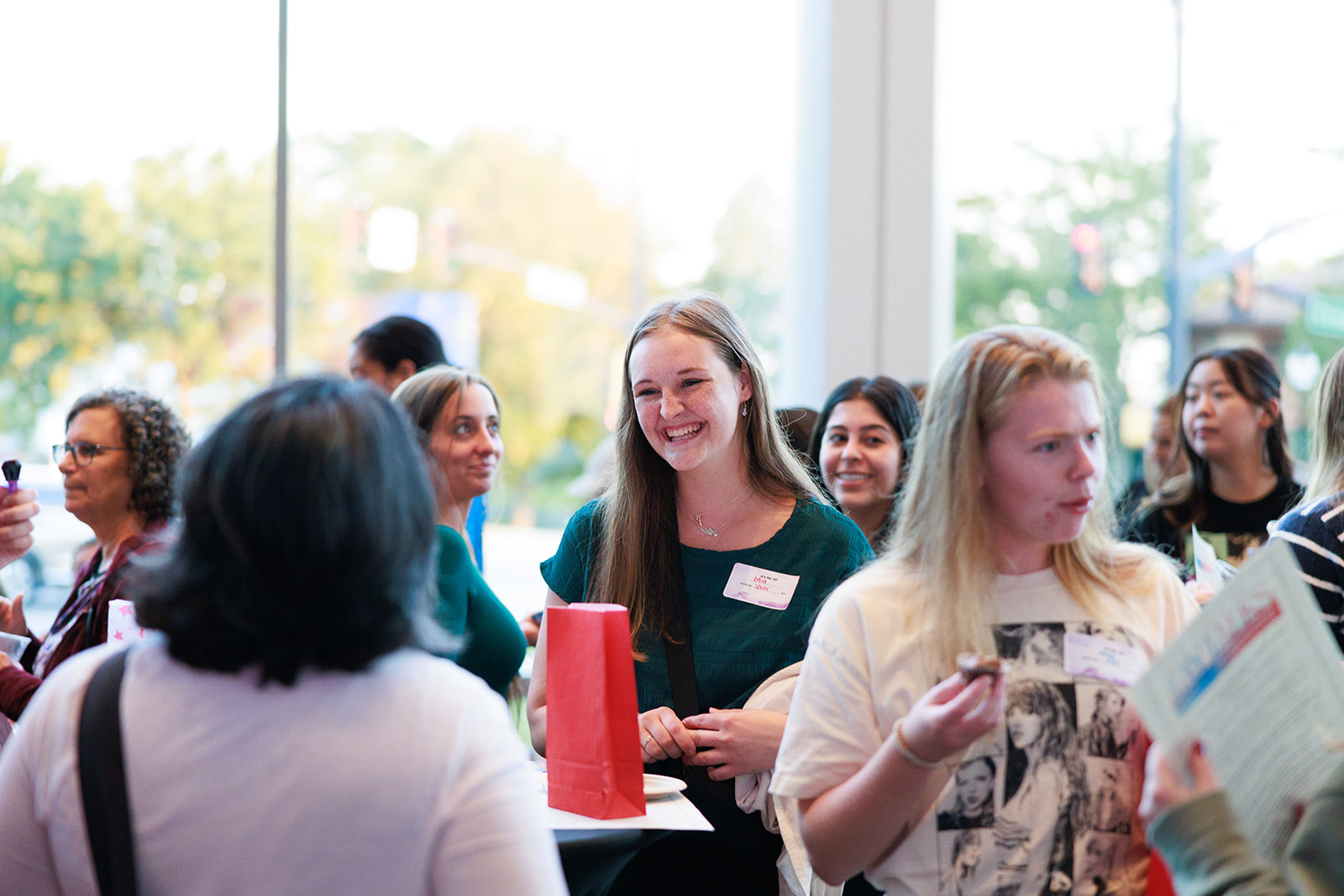 North Central College students talking at the Tay Talks event.