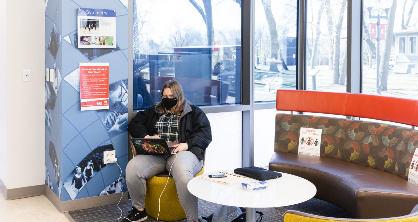 A North Central College MBA student studying.