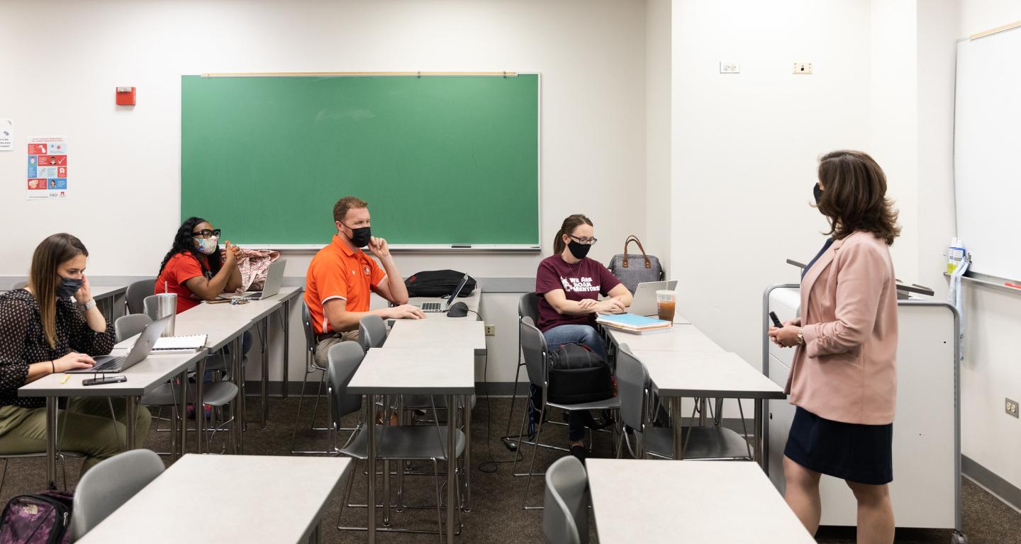 A group of business management students taking a class at North Central College.