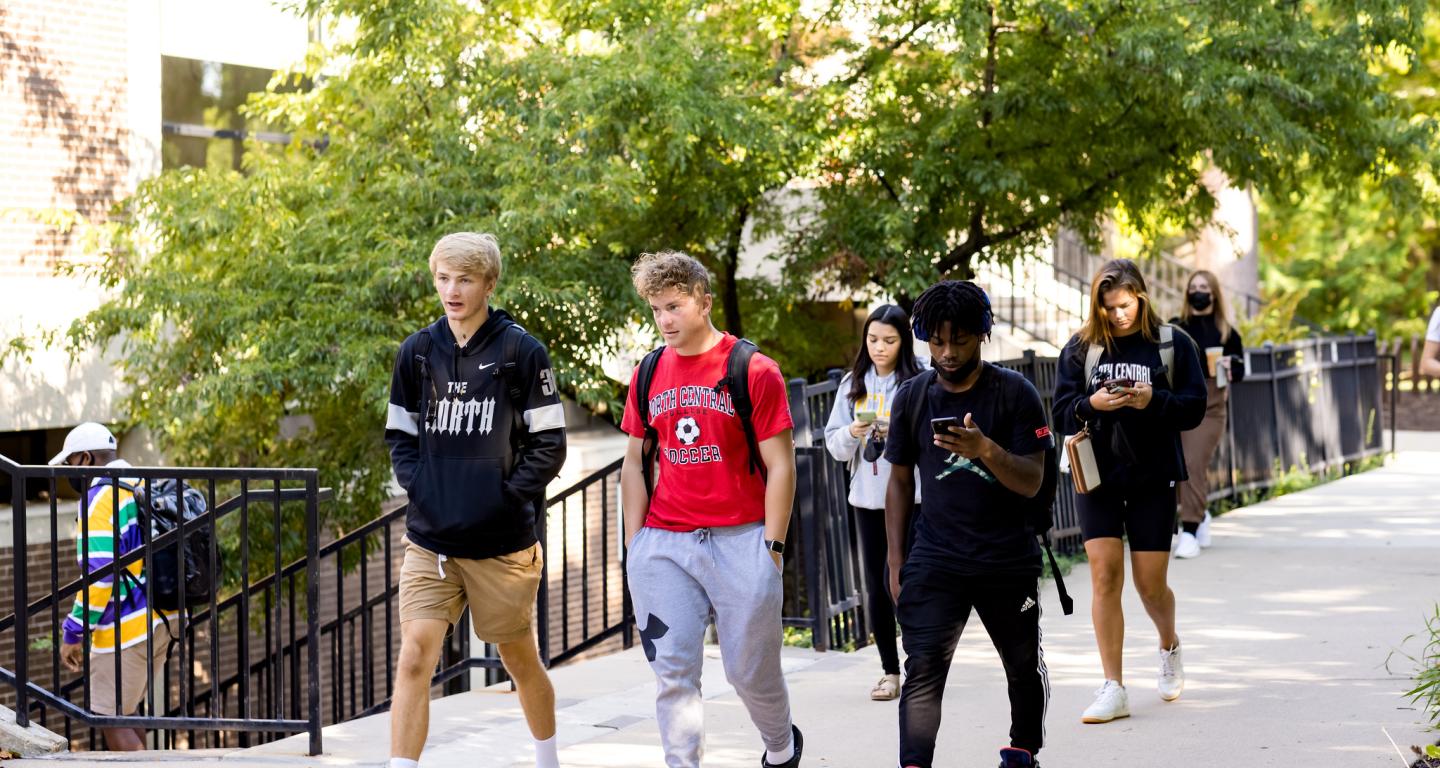 North Central College students walking on campus.