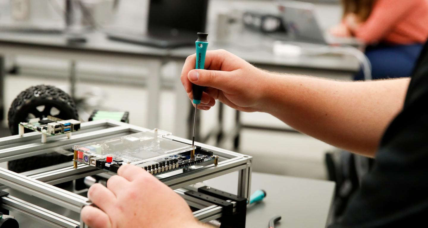 North Central College mechanical engineering students working on a project.