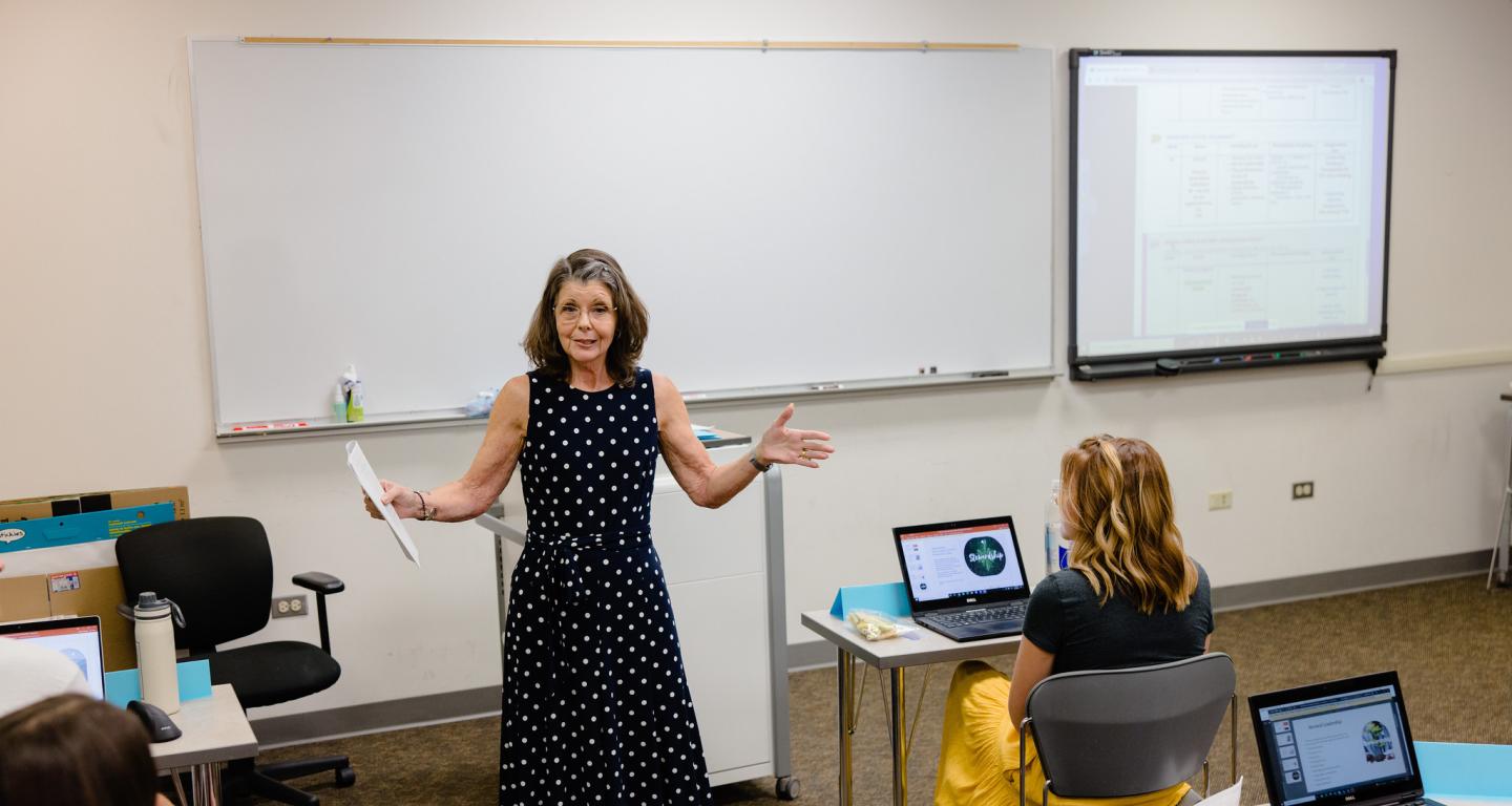 A professor talks to North Central College special education students.