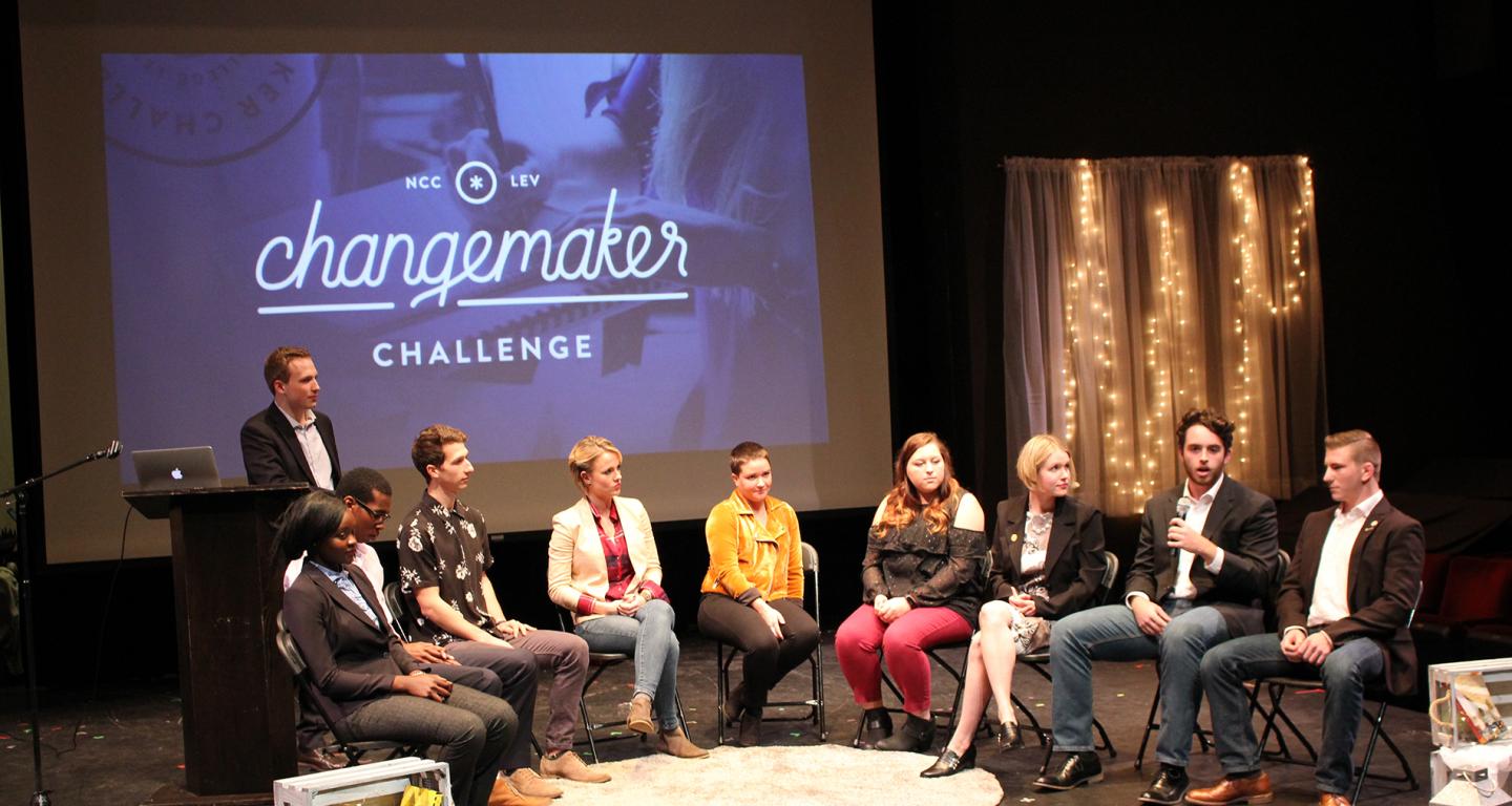 Students in discussion at the Changemaker Challenge.