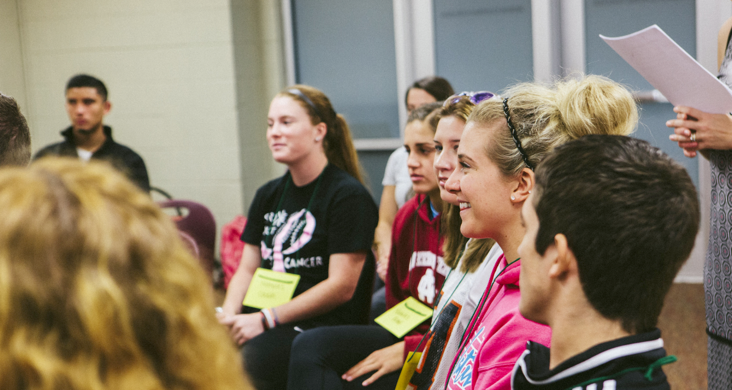 A group of North Central College students participating in a mental health seminar.