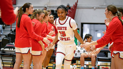 Jocelyn Trotter running onto the basketball court.