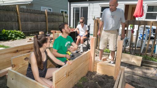 North Central College students working on a service project to build a garden.