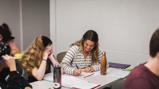 North Central College students filling out registration forms.